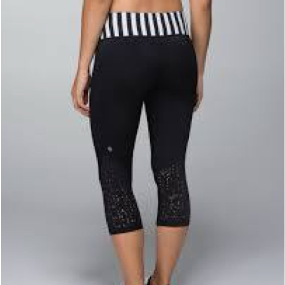Lululemon Size 6  Black “Water Bound”  Capri Leggings with Laser Cut Detail